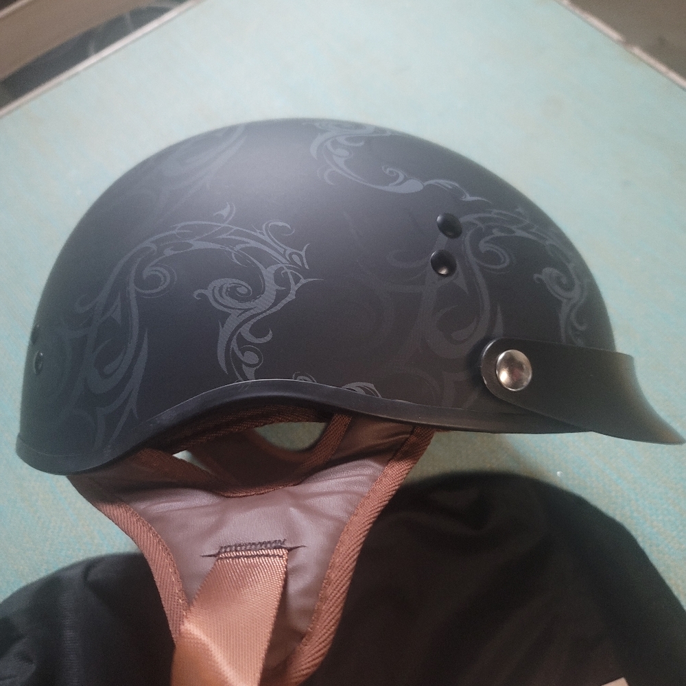 Stylish Black Helmet with Intricate Design